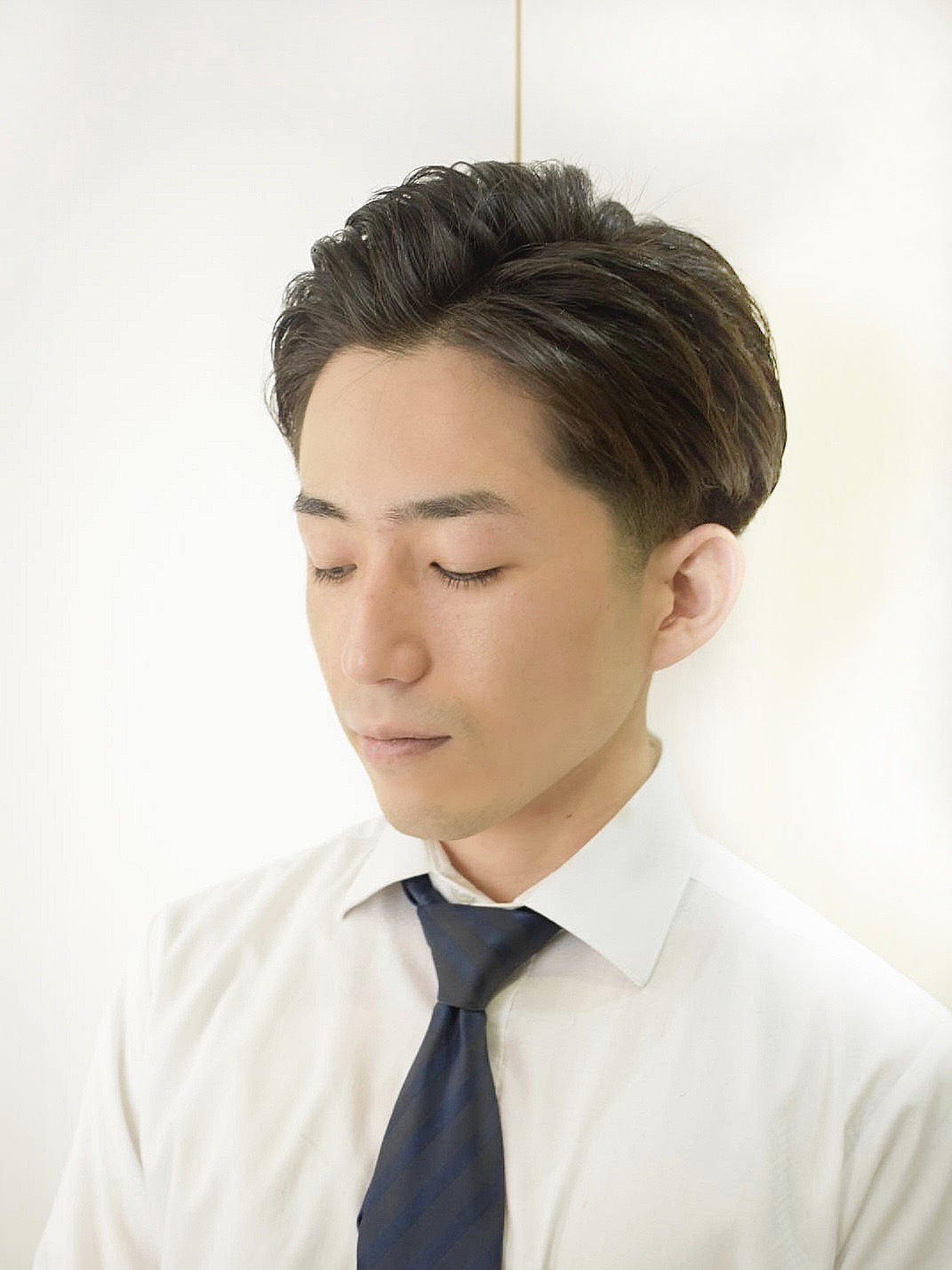 ポジティブビジネスマンオールバックスタイル