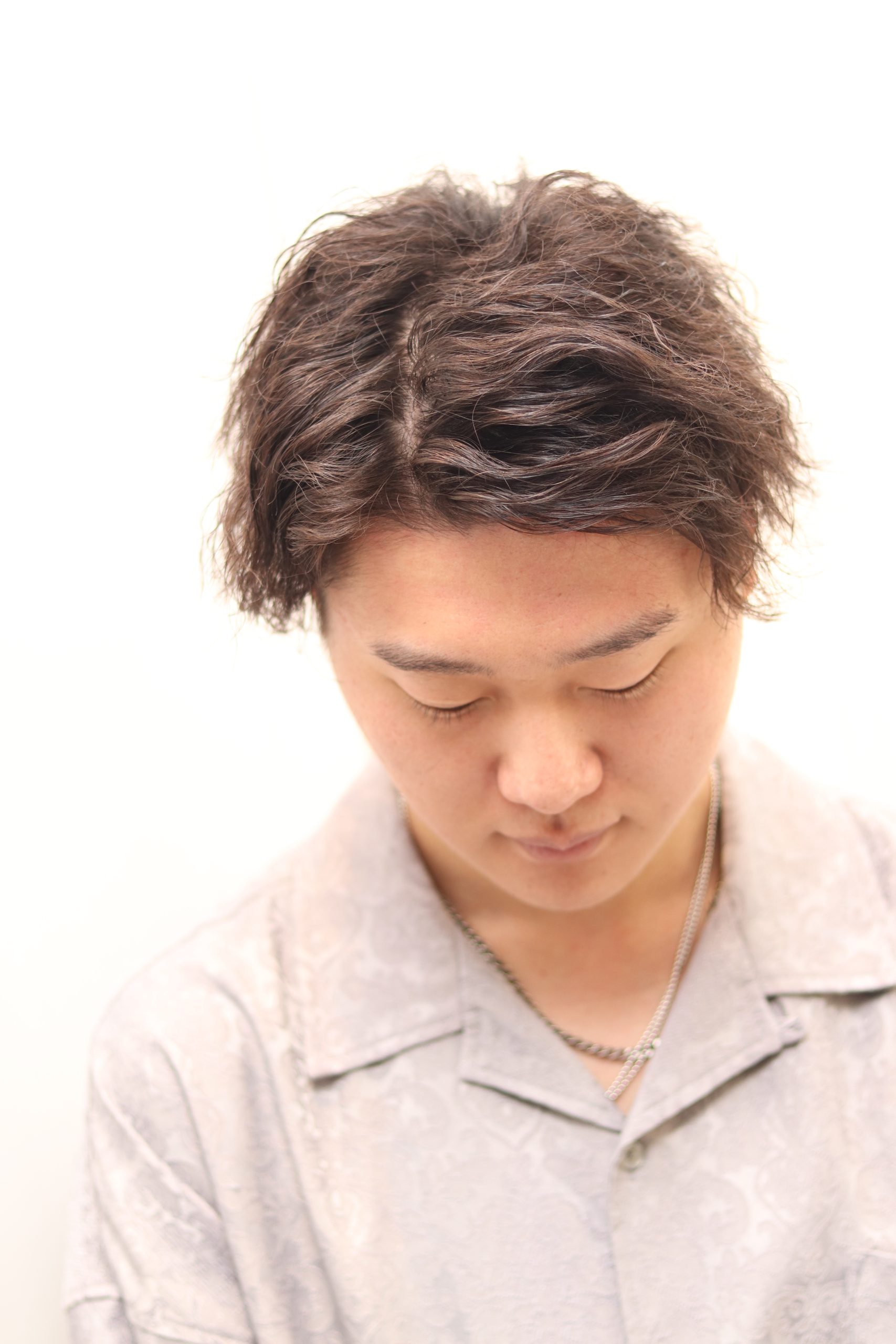 派手なツイストパーマでインパクト大!