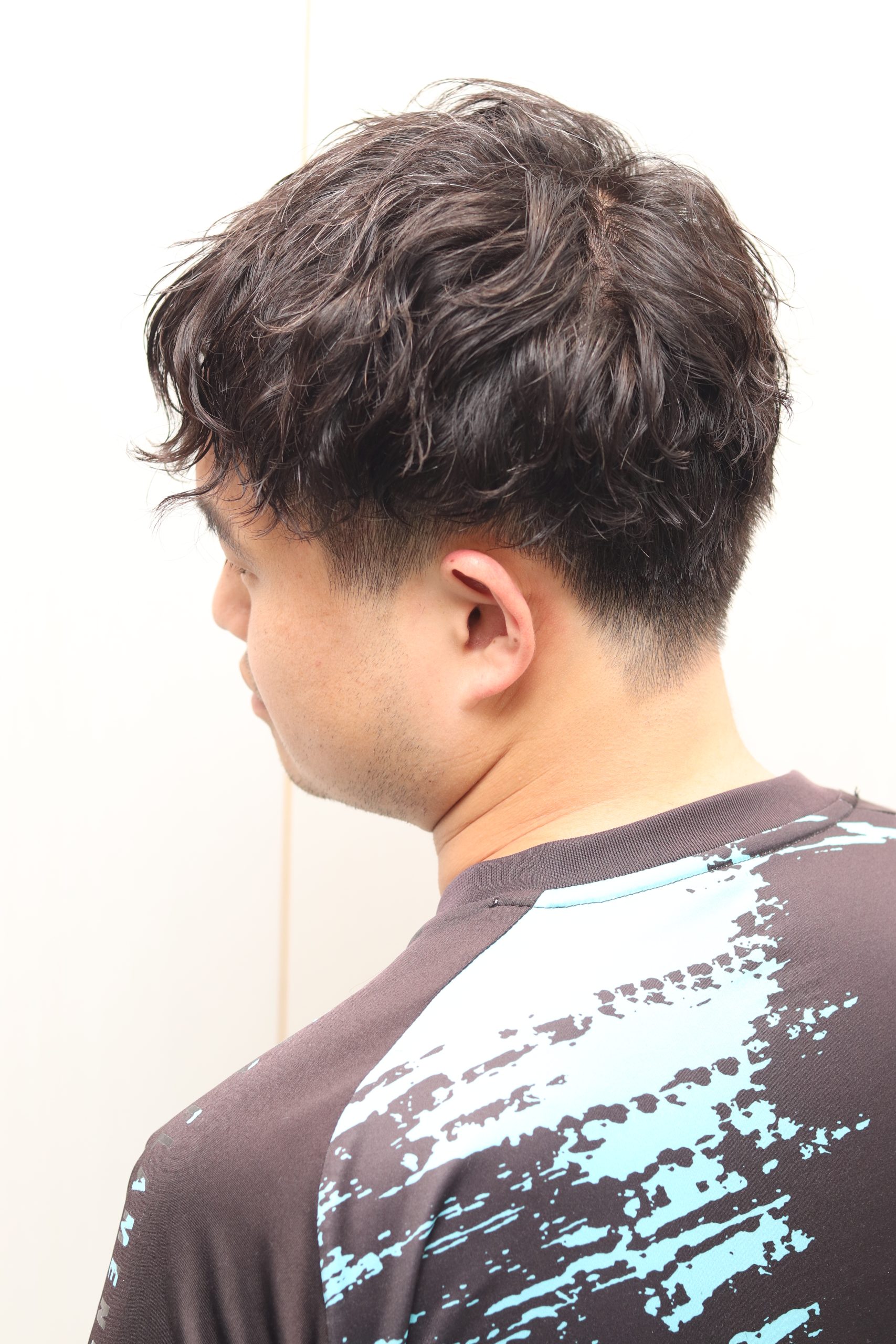 束感重視なスパイラルパーマ×ツーブロック